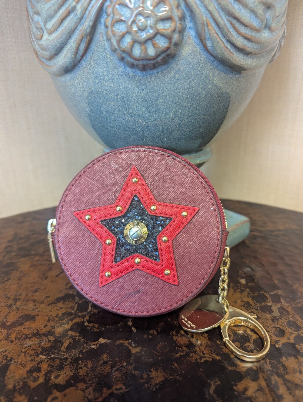 Henri Bendel West 57 Round Coin Purse Star Dark Red like burgundy.